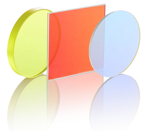 Assorted edge filters with long-pass and short-pass profiles arranged on a neutral surface.