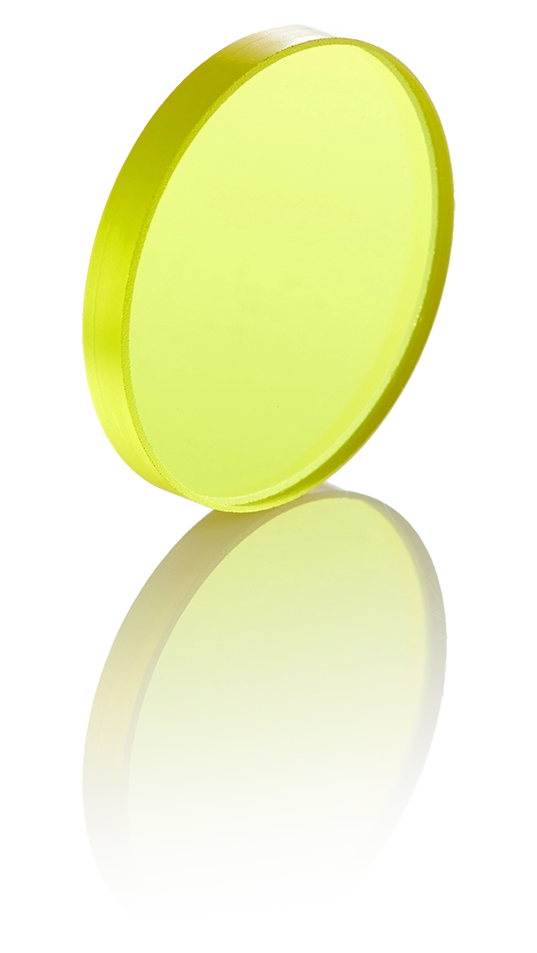 Assorted edge filters with long-pass and short-pass profiles arranged on a neutral surface.