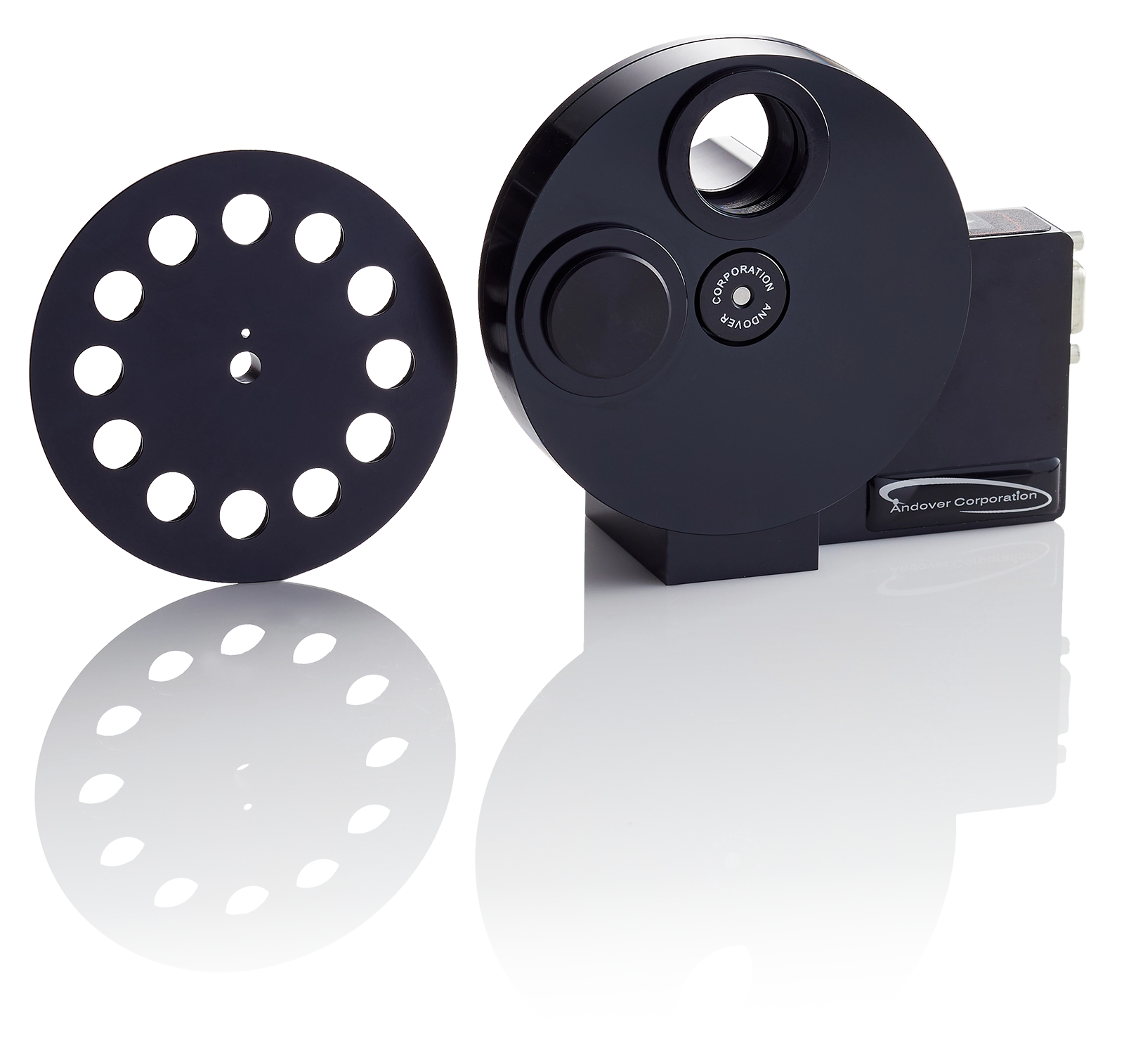 Filter wheel for mounting optical filters, shown on a white surface.